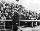 Crowds waiting for the visit of King George V at the transporter bridge with the bridge supervisor.