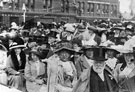 Crowd gathering outside the Market Hotel and the Town Hall possibly for the visit of King George V.